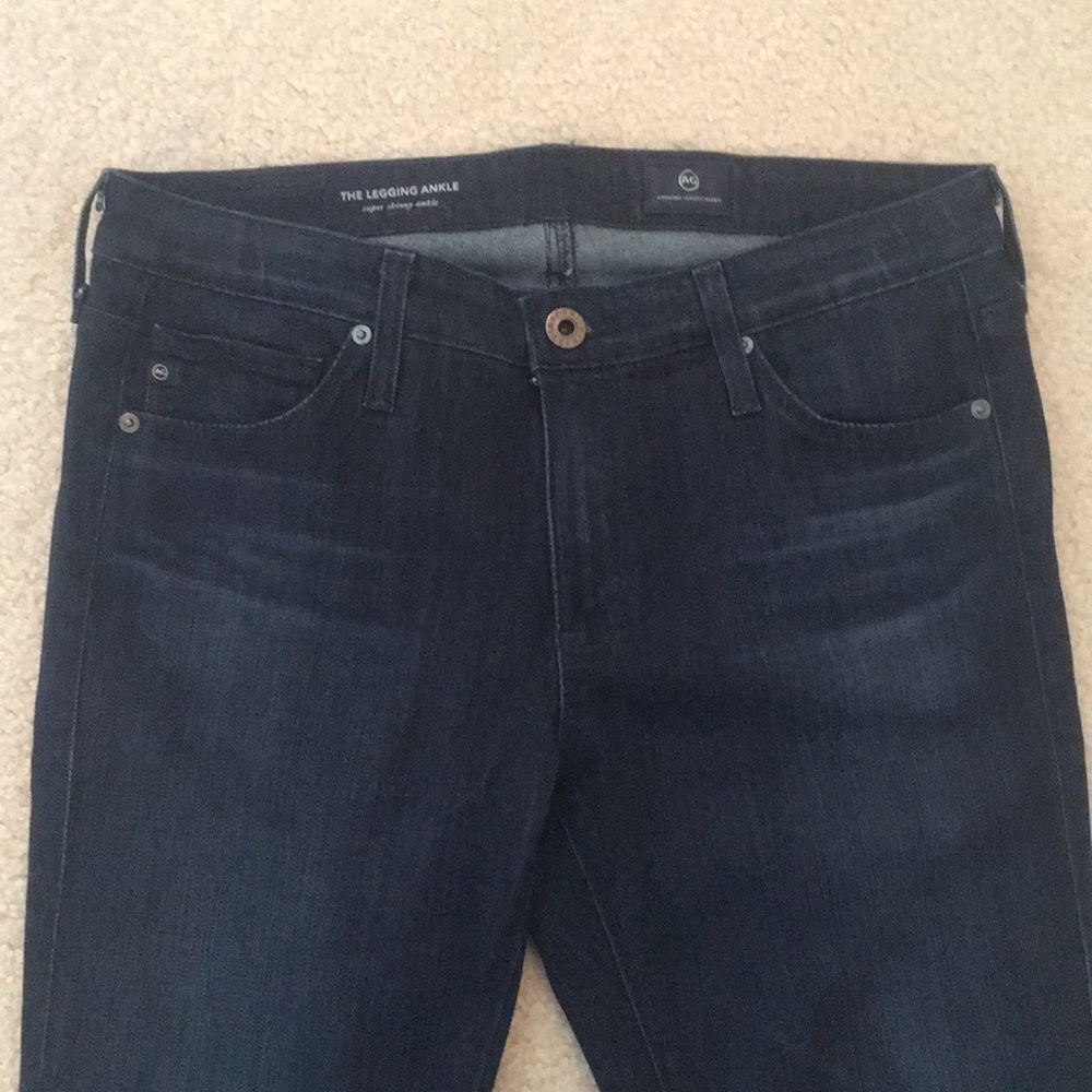 Adriano Goldschmied (AG) dark wash skinny jeans.